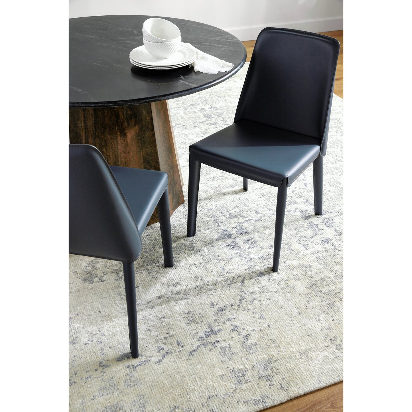 004 SI-2053490 | Lifestyle | Rosy Dining Chair (Set of 2) by Surya in dark blue and hand finished. Made from upholstery: pvc, base: metal, fill: 100% polyurethane foam in a modern style.
