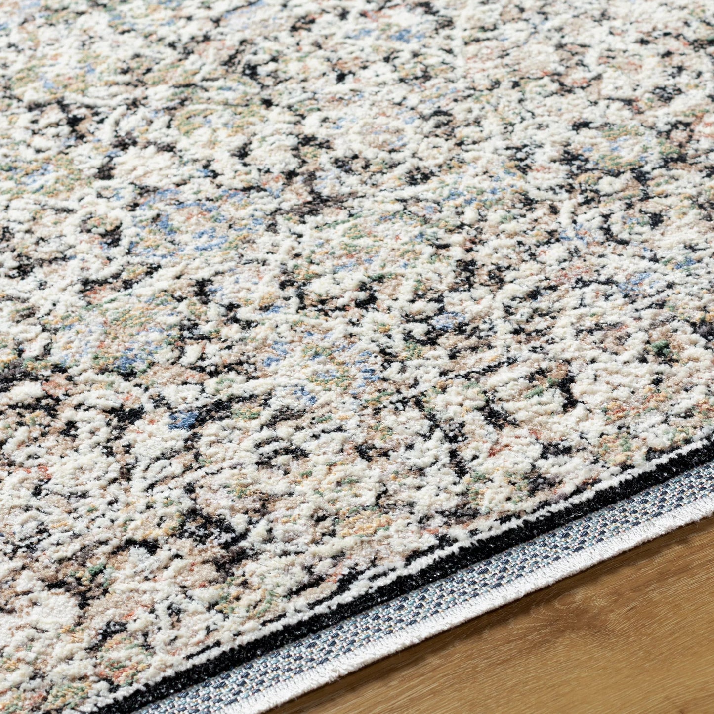 007 SI-2048912,SI-2048913,SI-2048914,SI-2048915,SI-2048916,SI-2048917,SI-2048918,SI-2048920 | Closeup | Rivaldo Rug - 477185 by Livabliss in light brown, cream, light slate, black, light olive, blue. Made from face: 100% polyester, warp: 100% cotton in a u