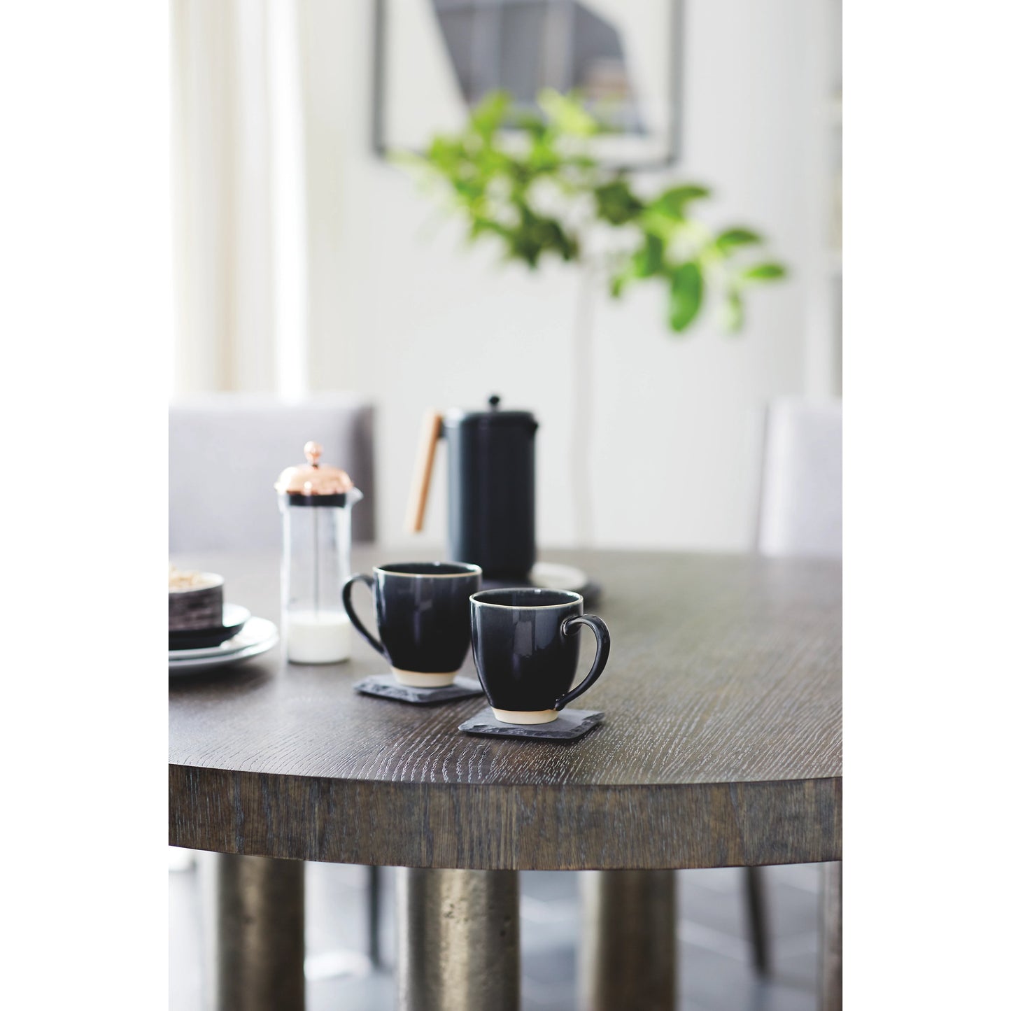 005 SI-1711408 | Additional Silo | Linea Round Dining Table by Bernhardt in cerused charcoal, textured graphite metal. Made from white oak veneers, cast aluminum in a unique style.