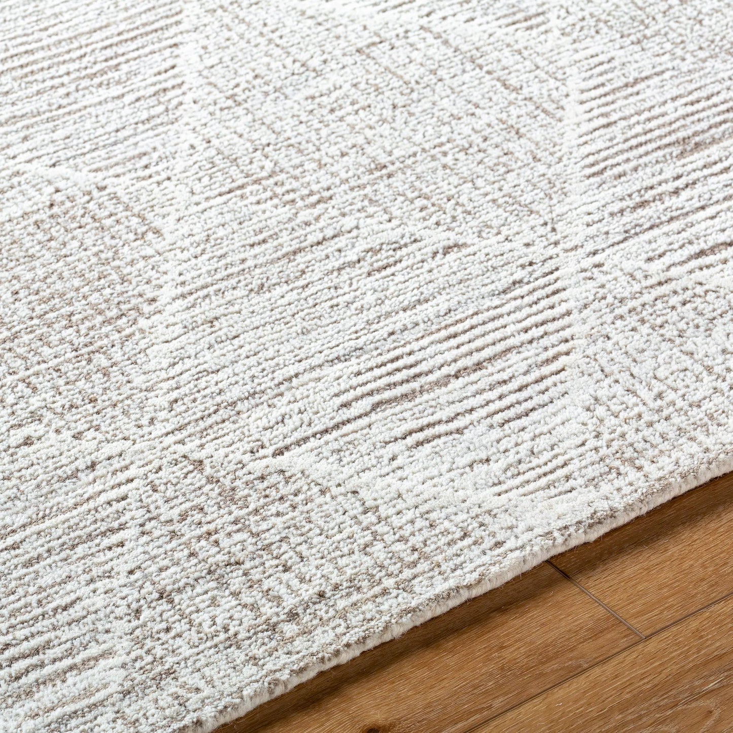 005 SI-2167609,SI-2167610,SI-2167611,SI-2167612,SI-2167613 | Closeup | Rize Rug - 488554 by Livabliss in ivory, taupe, light gray. Made from wool in a unique style.
