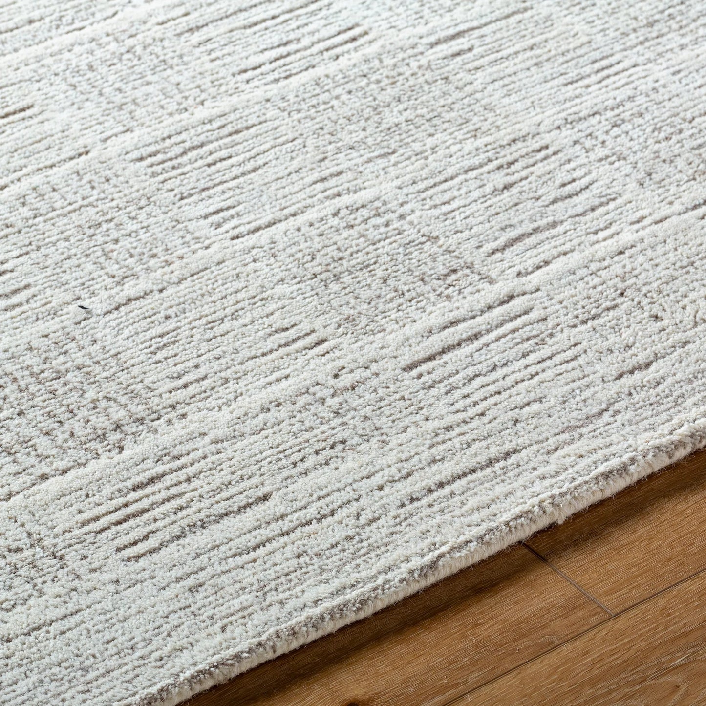 004 SI-2167632,SI-2167633,SI-2167634,SI-2167635,SI-2167636 | Closeup | Rize Rug - 488607 by Livabliss in ivory, dove gray, ash, pearl. Made from wool in a unique style.