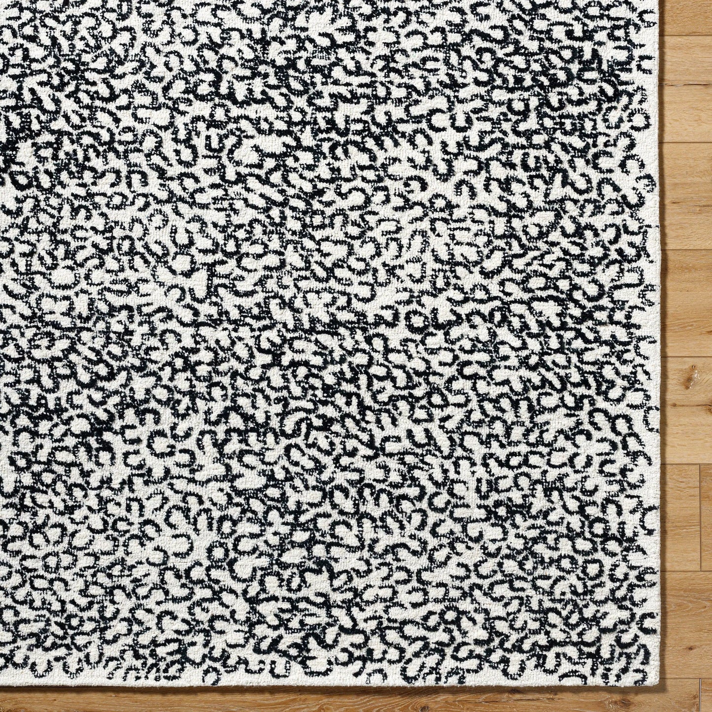 007 SI-2167637,SI-2167638,SI-2167639,SI-2167640,SI-2167641,SI-2167642 | Closeup | Rize Rug - 488617 by Livabliss in charcoal, ash gray, snow white. Made from wool in a unique style.