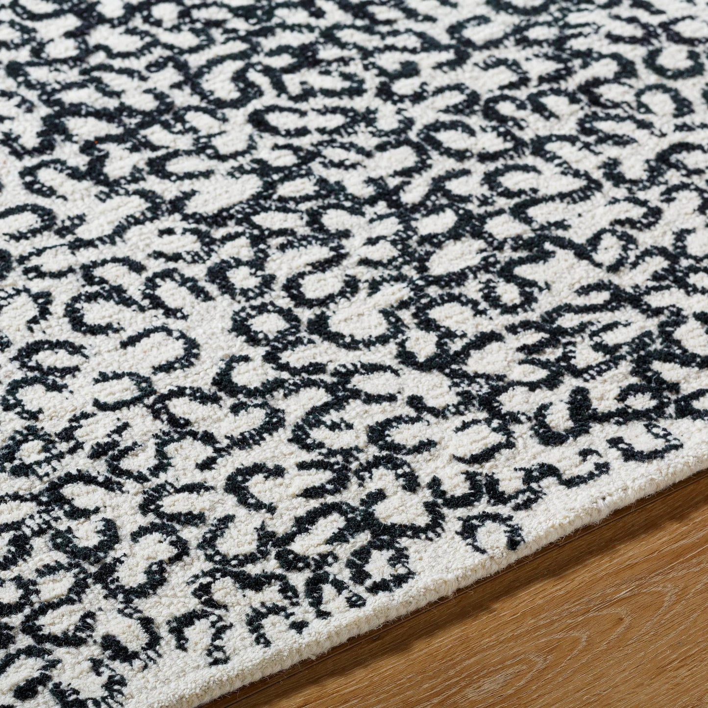 006 SI-2167637,SI-2167638,SI-2167639,SI-2167640,SI-2167641,SI-2167642 | Closeup | Rize Rug - 488617 by Livabliss in charcoal, ash gray, snow white. Made from wool in a unique style.