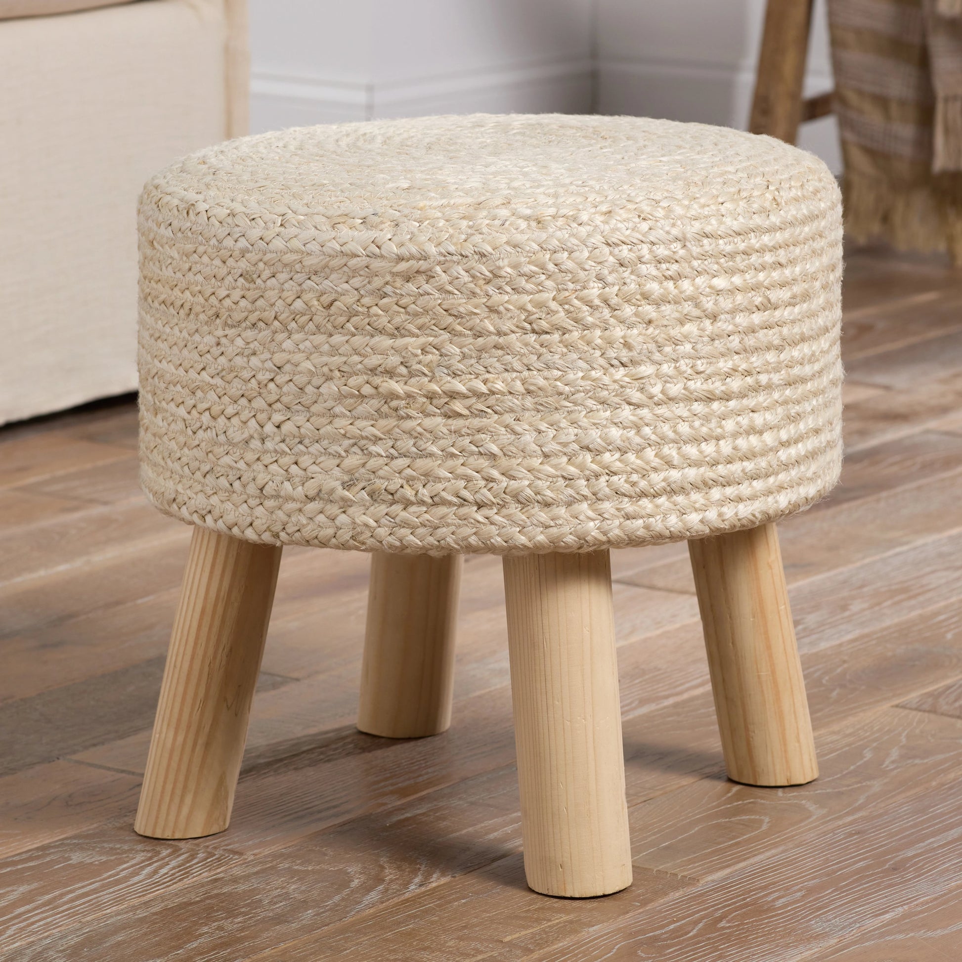Saba Stool SBT03 Pouf by Jaipur Living in beige. Made from 100% jute fiber in a rustic style.