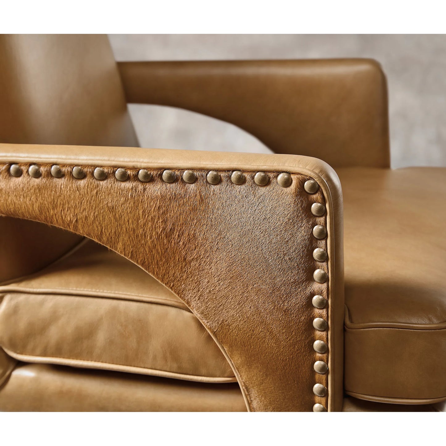 003 SI-2354034 | Closeup | Rochelle Executive Swivel Tilt Chair by Hooker Furniture in dark blonde. Made from leather in a unique style.