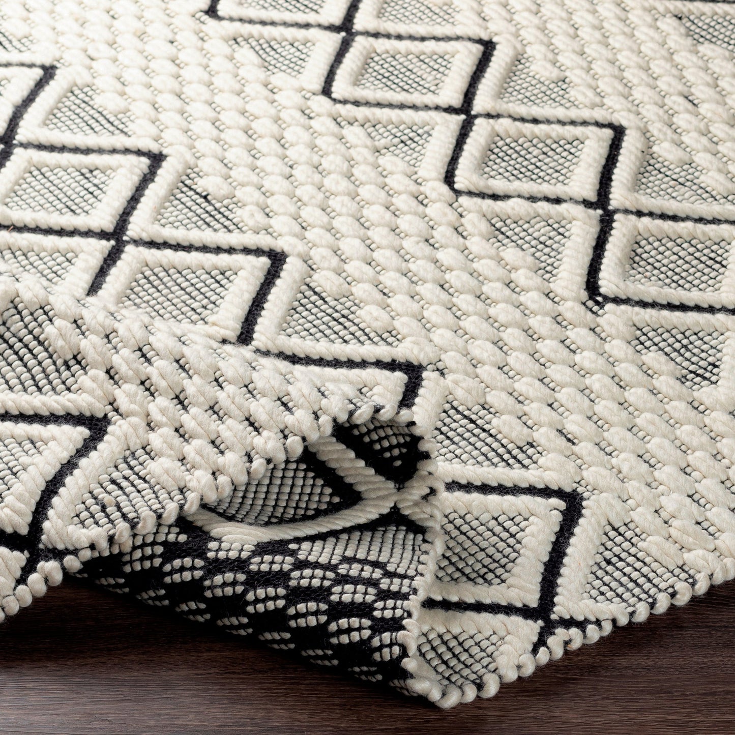 006 SI-1890048,SI-1890050,SI-1890052,SI-1890053,SI-1890054 | Closeup | Saint Clair Rug - 27901 by Surya in black, cream. Made from 100% new zealand wool in a unique style.