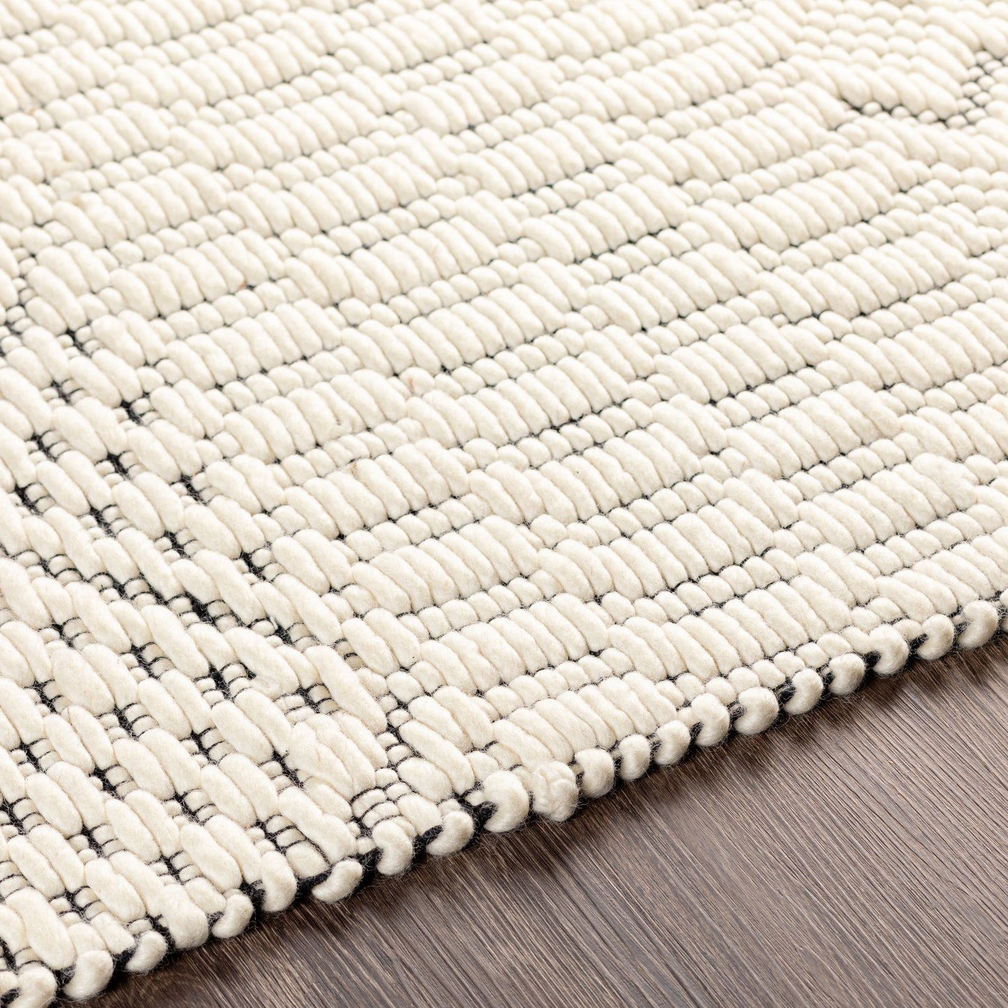 004 SI-1890055,SI-1890057,SI-1890059,SI-1890060,SI-1890061 | Closeup | Saint Clair Rug - 27902 by Surya in black, cream. Made from 100% new zealand wool in a unique style.