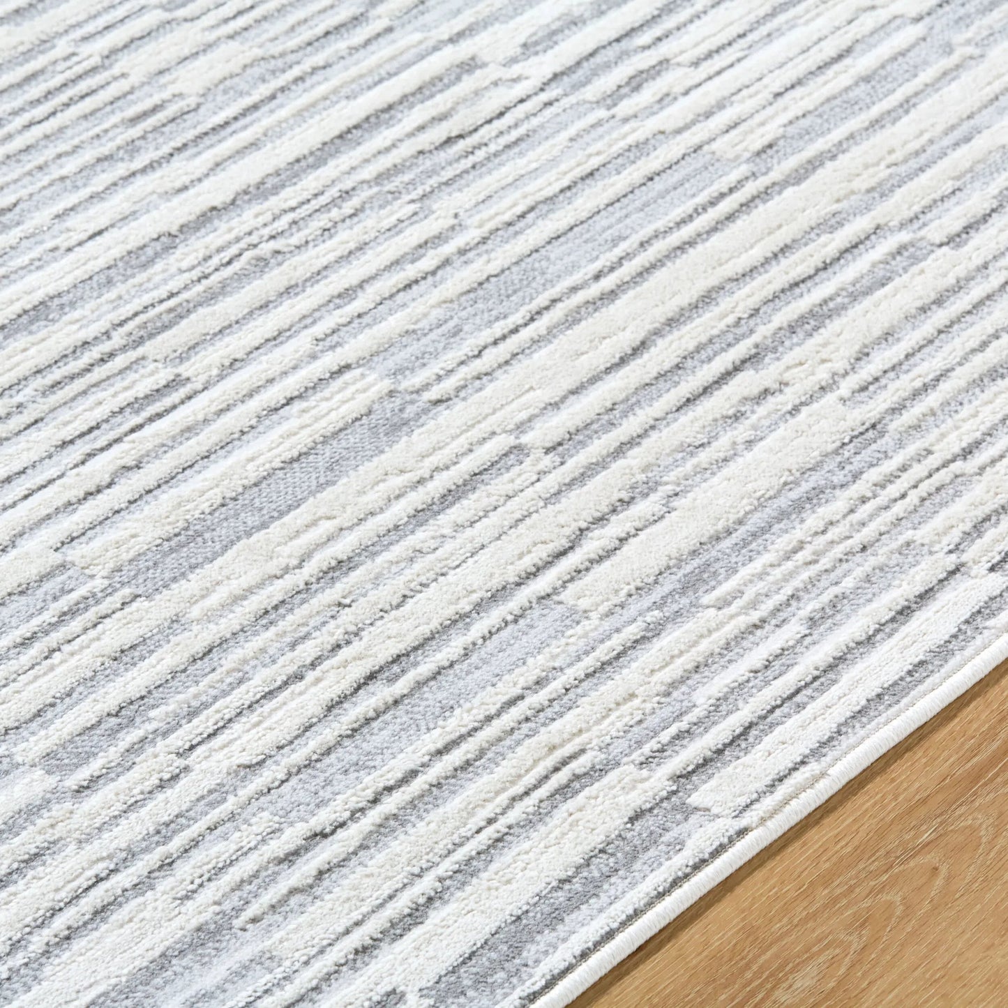 004 SI-2169040,SI-2169041 | Closeup | Siyah Rug - 537438 by Livabliss in light silver, metallic - silver, silver, ash, prairie dust. Made from polyester, polypropylene in a unique style.