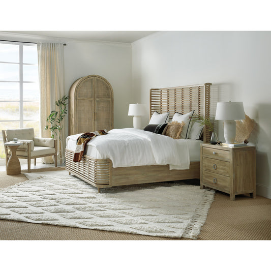 Surfrider Three Drawer Nightstand by Hooker Furniture in driftwood. Made from pecan veneers, cedar, felt panel, outlet, self-closing undermount drawer guides, solid-wood edge top in a coastal style.