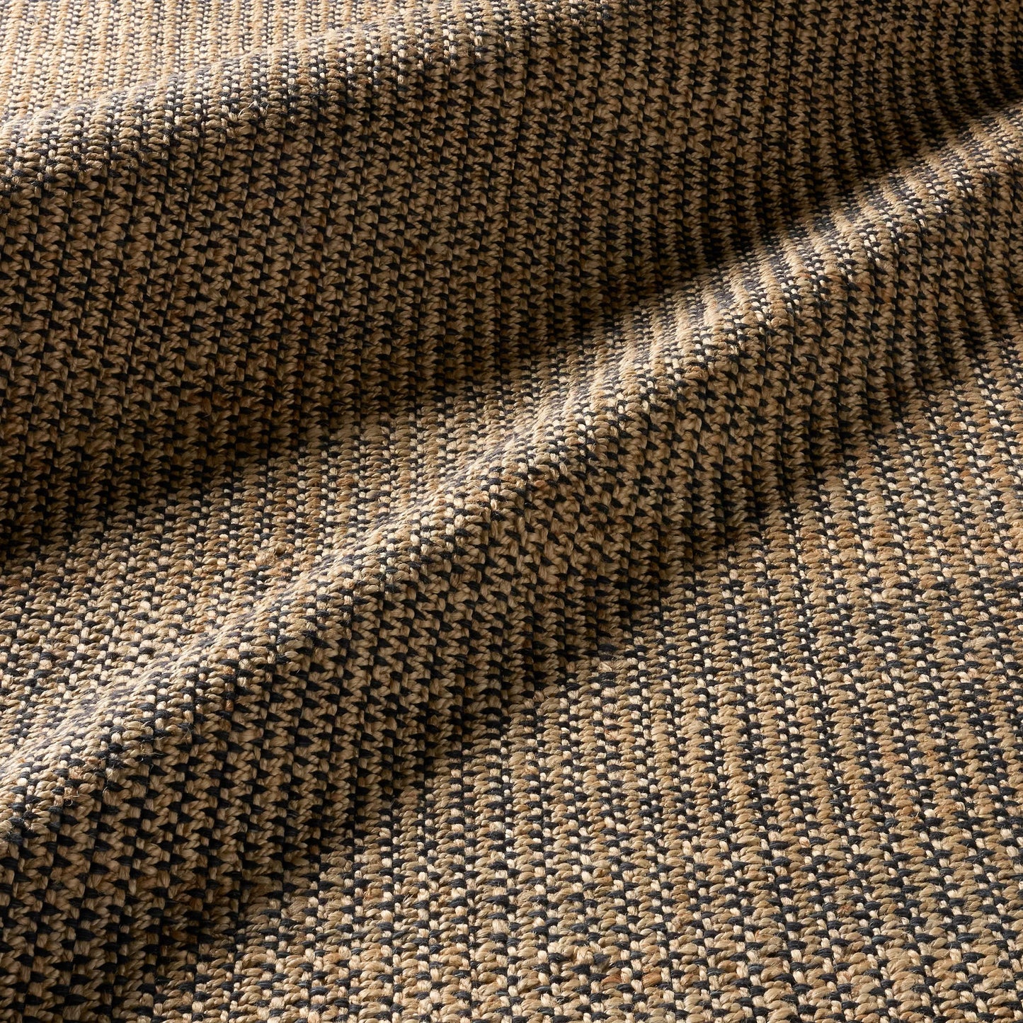 006 SI-2531426,SI-2531427,SI-2531428,SI-2531429,SI-2531430,SI-2531431,SI-2531432 | Closeup | Song Of The Sahara SOS03 Rug by Jaipur Living in black, tan, beige. Made from 80% jute 20% wool in a unique style.