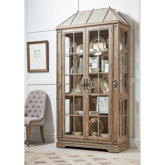 Architrave China Cabinet by A.R.T. Furniture in almond. Made from pine solids and veneer, glass, metal in a traditional style.