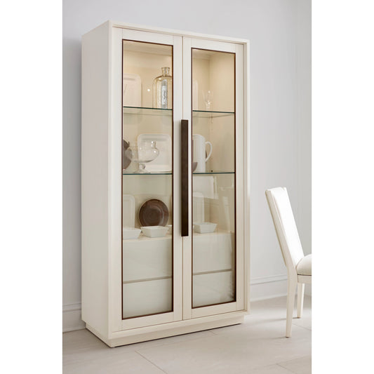 Blanc Display Cabinet by A.R.T. Furniture in alabaster, burnished bronze. Made from parawood solids, metal, glass in a modern style.