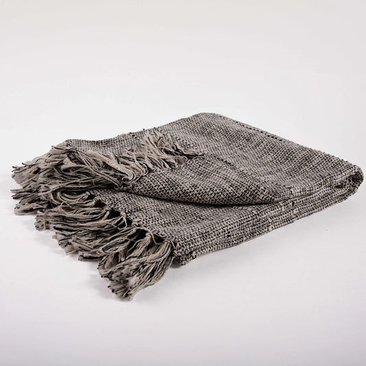 Craighead Throw by HedgeApple Essentials in black, natural. Made from cotton in a modern style.