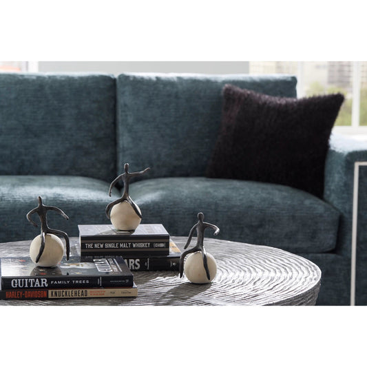 Pointing Seated Figure by Phillips Collection in beige, bronze. Made from metal, wood in a eclectic & global style.