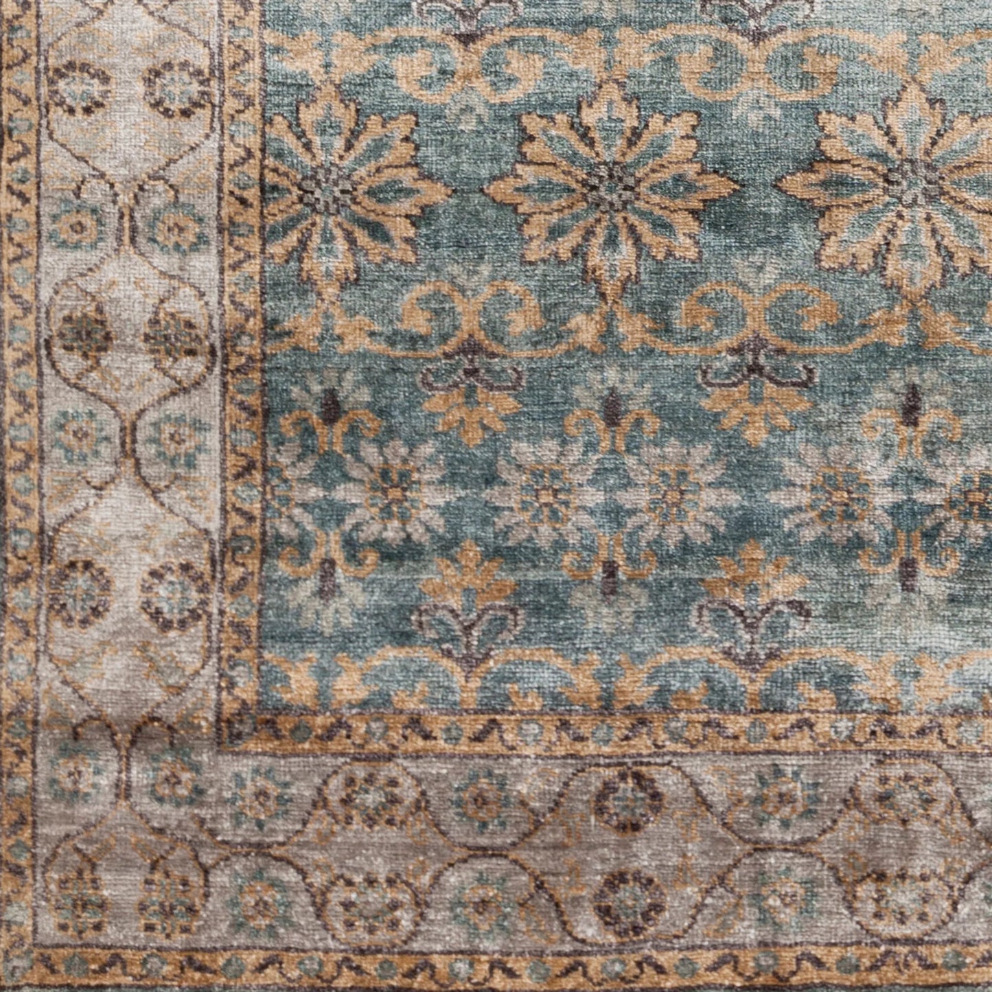 002 63575-25211,63575-25215 | Closeup | Theodora Rug - 12937 by Surya in teal, charcoal, wheat, light gray. Made from 100% bamboo silk in a unique style.