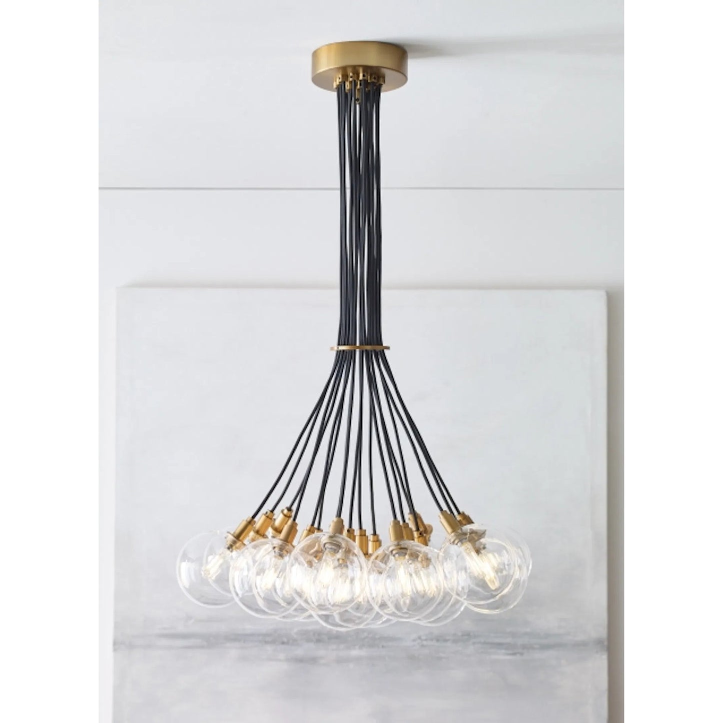 005 SR-807711,SR-807712 | Closeup | Gambit Multi-Port Chandelier by Tech Lighting in aged brass. Made from glass in a modern style.