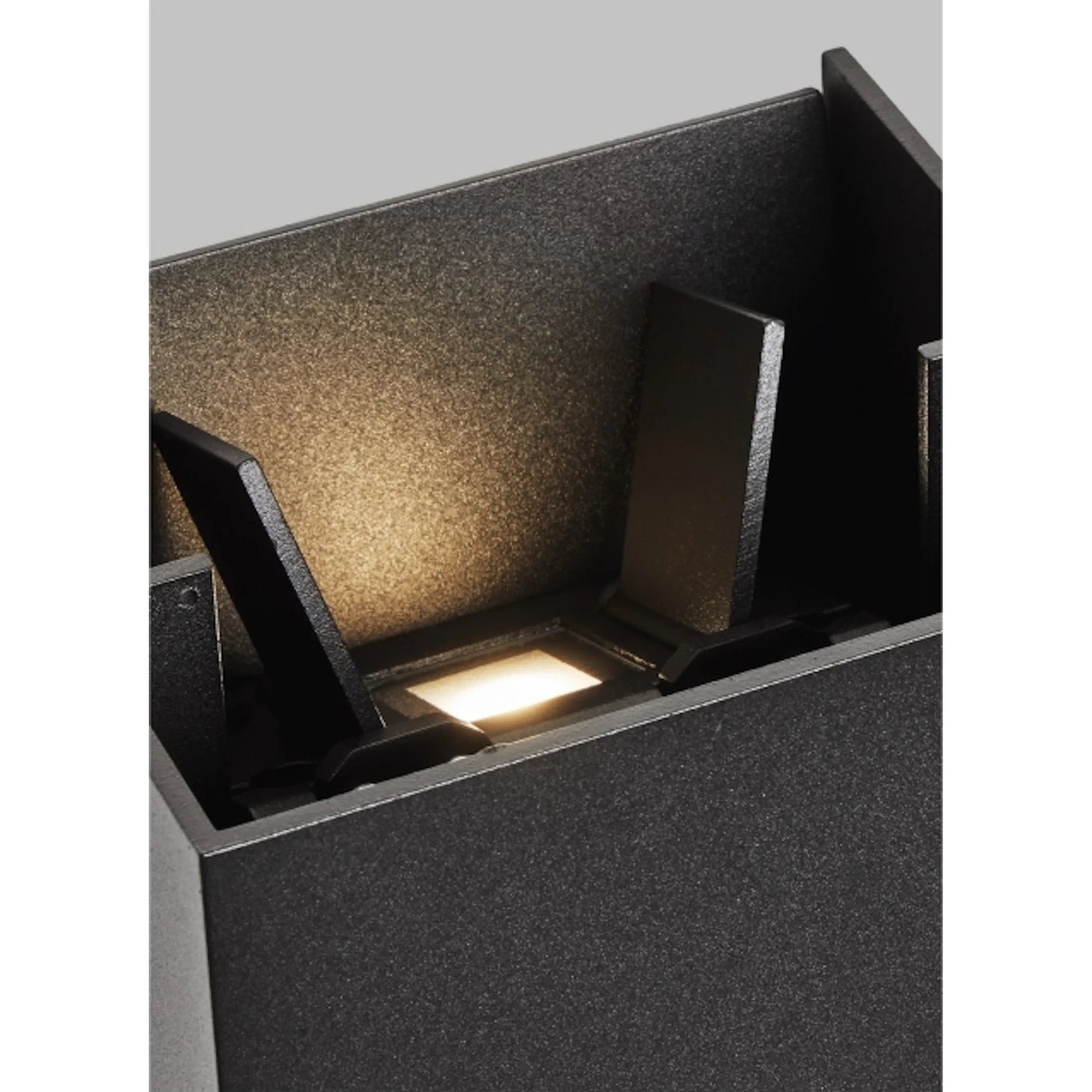 005 SI-2231270,SI-2231271,SI-2231272,SI-2231273 | Closeup | Vex 12" Outdoor Wall Sconce by Visual Comfort & Co.. Made from aluminum in a unique style.