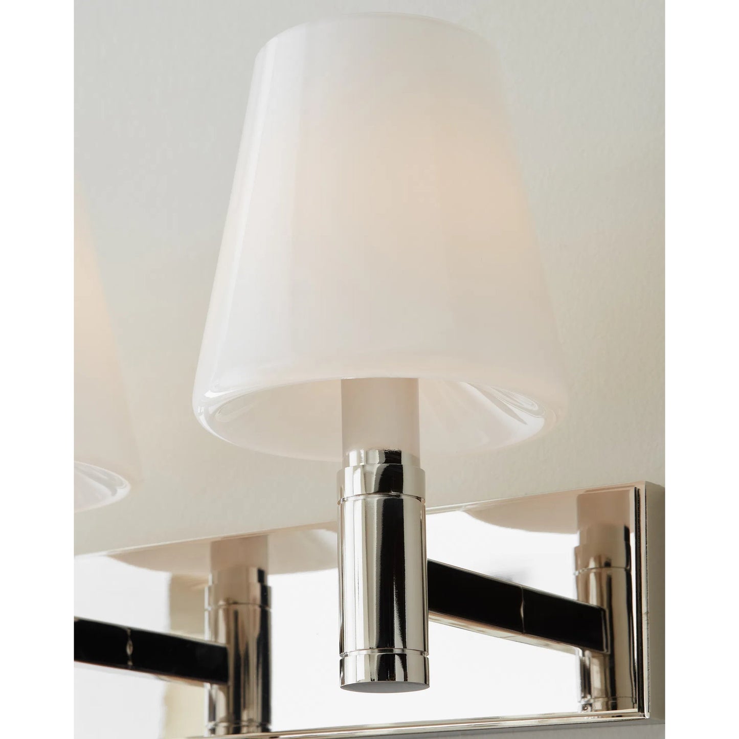 003 SI-2235840 | Closeup | Beckham Classic 3-Light Vanity by Visual Comfort & Co. in polished nickel. Made from steel in a unique style.