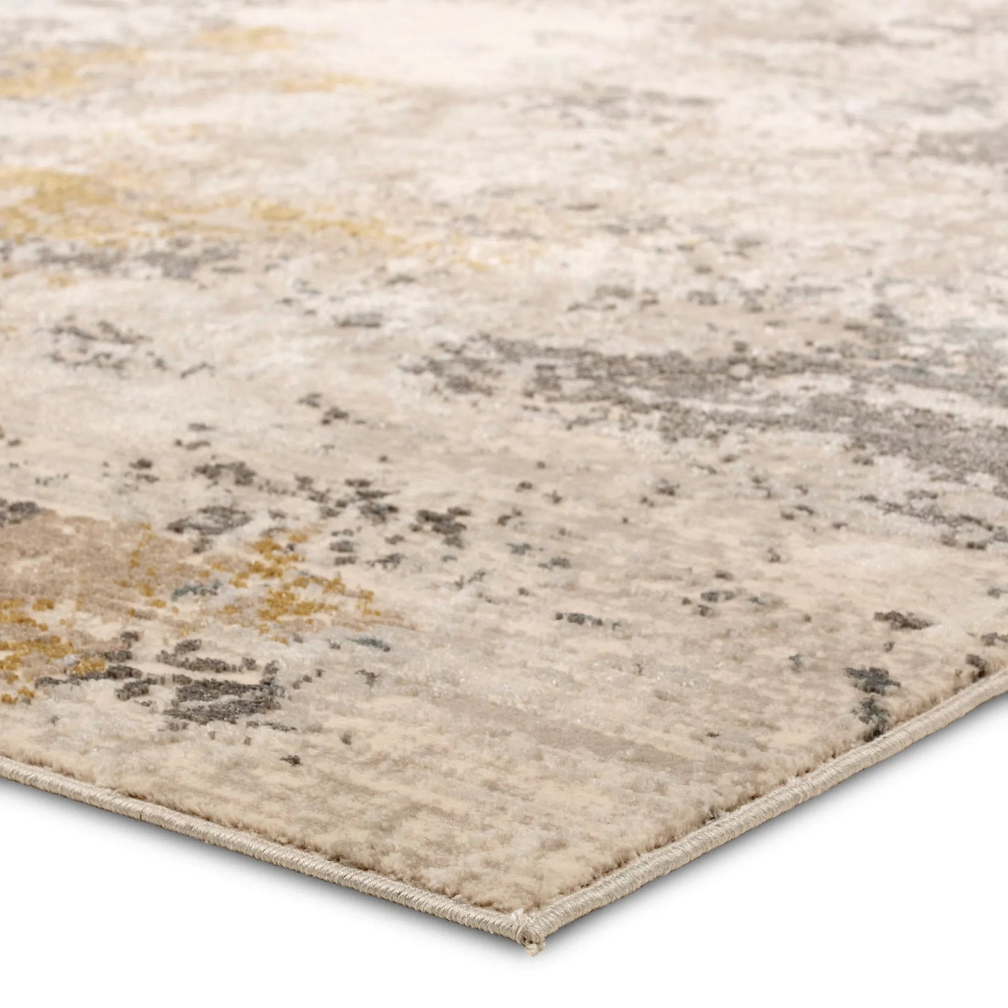 004 SI-2355136,SI-2355137,SI-2355138,SI-2355139,SI-2386498 | Closeup | Toprak TOP01 Rug by Jaipur Living in tan. Made from 100% polyester in a unique style.