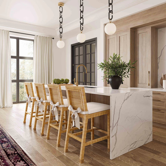 Amara Rattan Counter Stool by TOV Furniture in natural. Made from fabric, rattan veneer, wood in a cottage & farmhouse style.