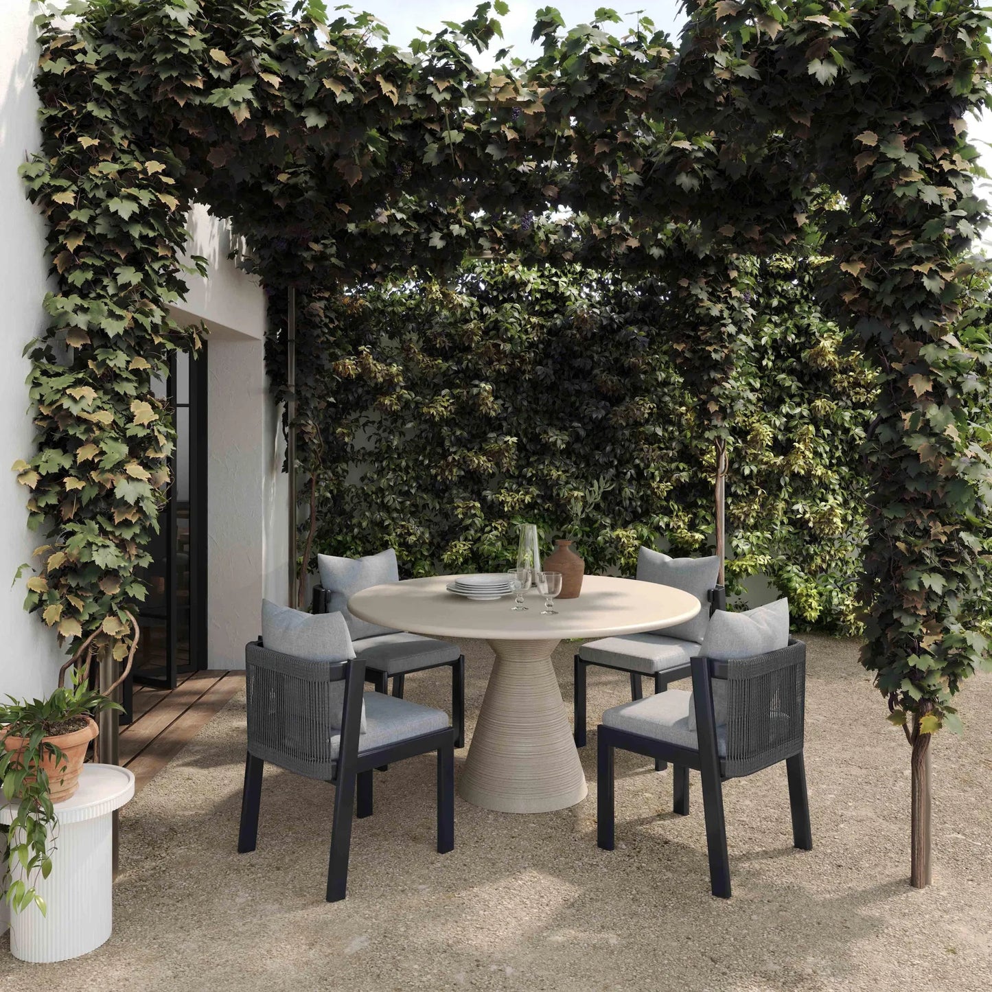 006 SI-2248230 | Lifestyle | Fern Textured Faux Plaster Concrete Indoor/Outdoor Round Dining Table by TOV Furniture in beige. Made from concrete in a unique style.