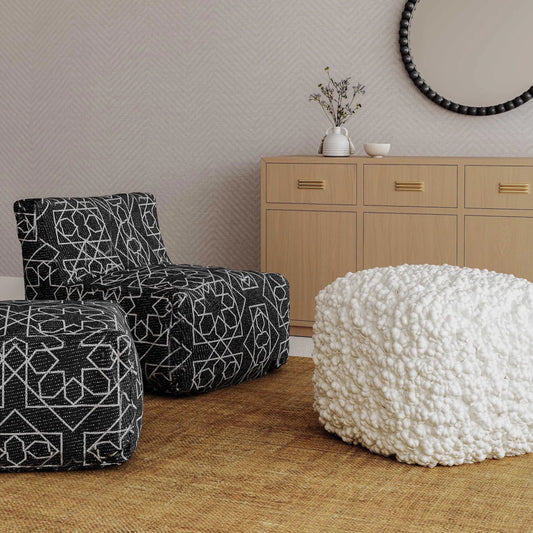 Cathy Woven Pouf by TOV Furniture in cream. Made from cotton, polyester in a rustic style.