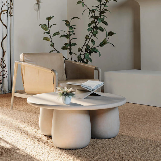 Rahul Round Outdoor Coffee Table by TOV Furniture in off-white. Made from frp in a transitional style.