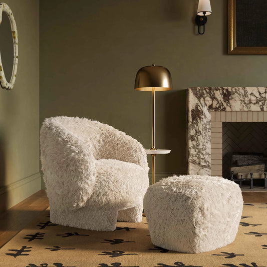 Britt Vegan Shearling Ottoman by TOV Furniture. Made from faux shearling, plywood in a eclectic & global style.