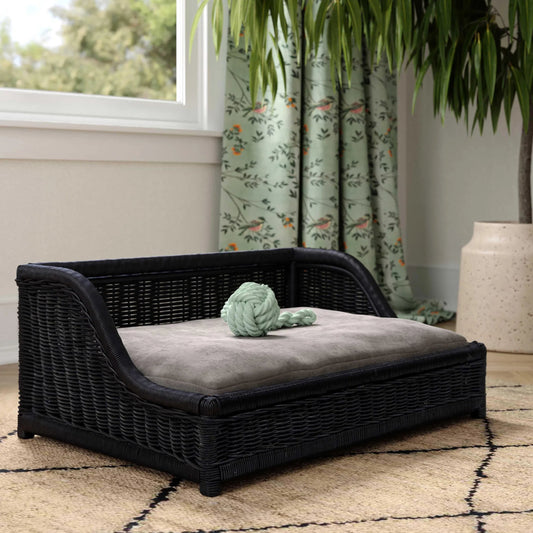Poppy Rattan Pet Bed by TOV Furniture in black. Made from natural cane in a rustic style.