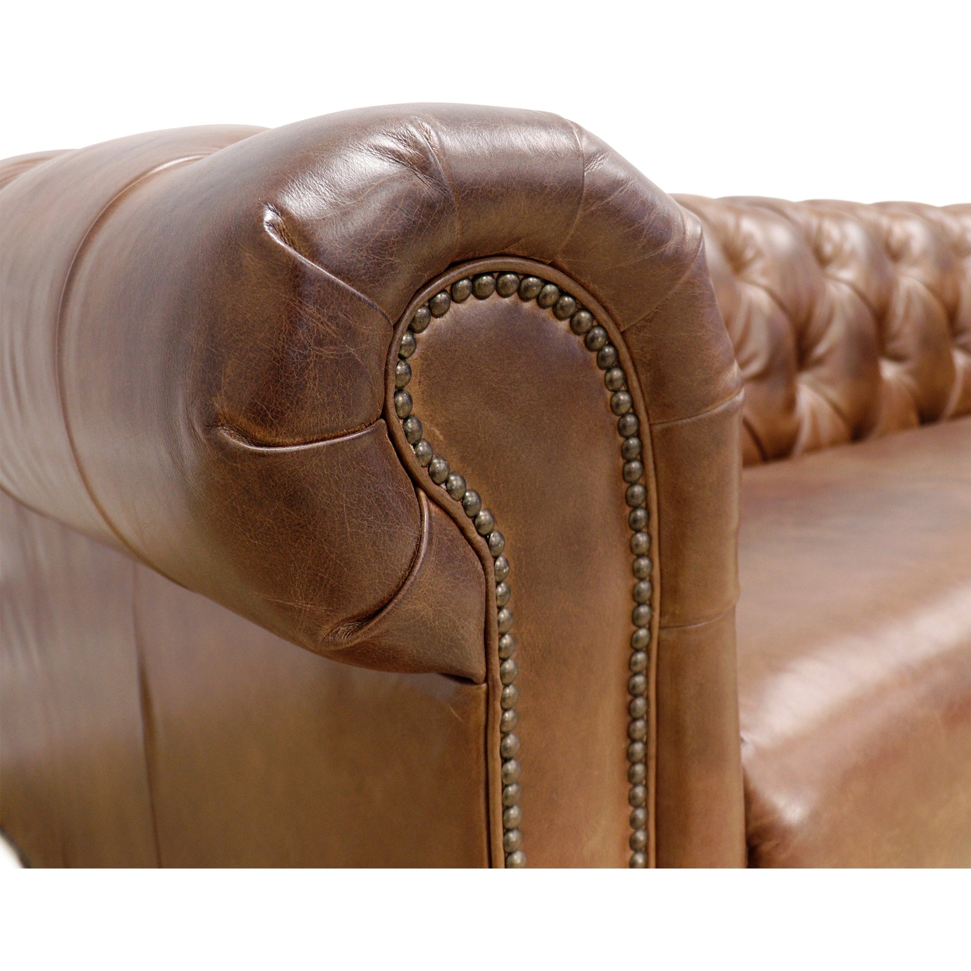Paris Club Chesterfield Sofa by Pasargad Home in brown. Made from top grain vintage cigar finish leather in a transitional style.