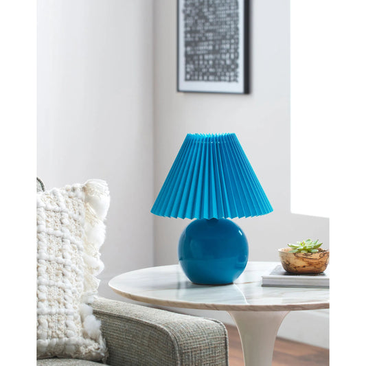 Tremel Accent Table Lamp by Livabliss in glazed. Made from ceramic, polyester, polystyrene in a eclectic & global style.