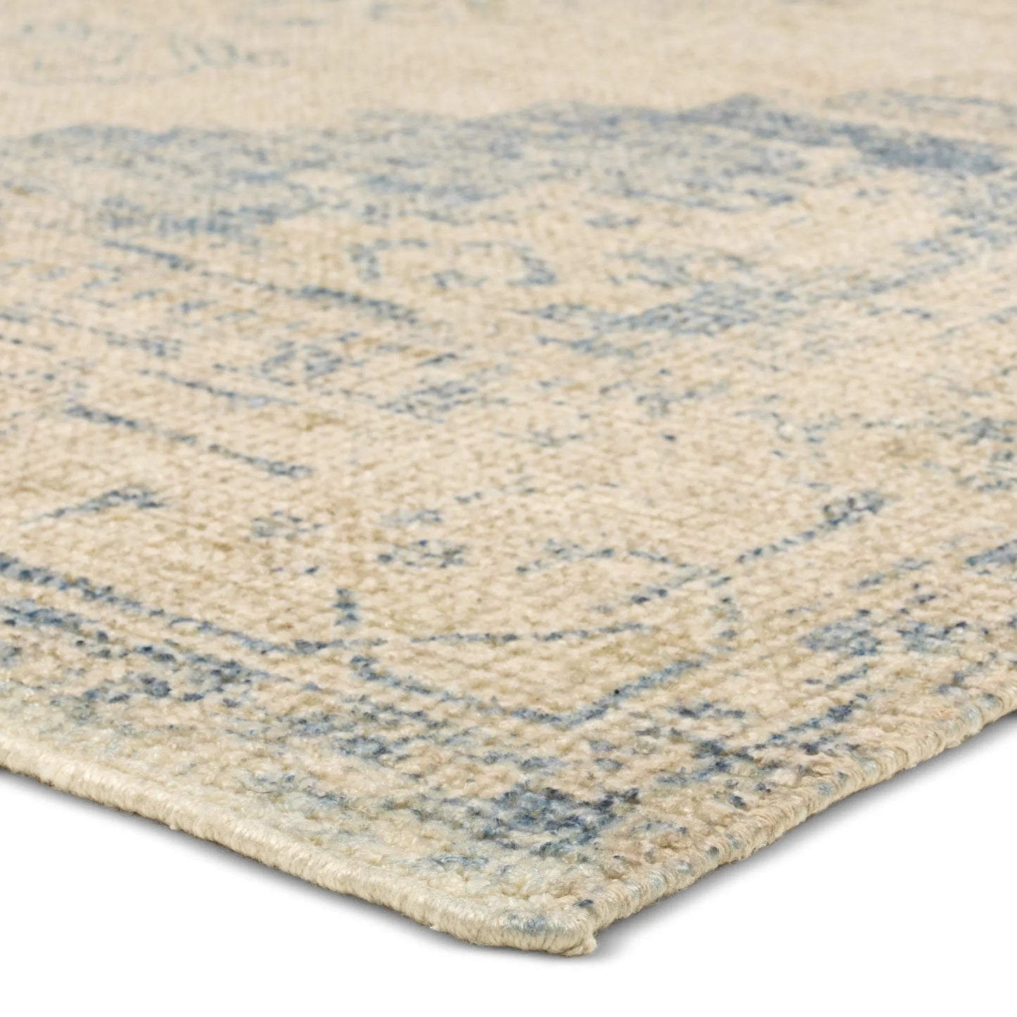 003 SI-2449314,SI-2449315,SI-2449316,SI-2449317,SI-2449318 | Closeup | Tesorino By House Sprucing TRN02 Rug by Jaipur Living in beige, blue. Made from 100% pet yarn in a unique style.