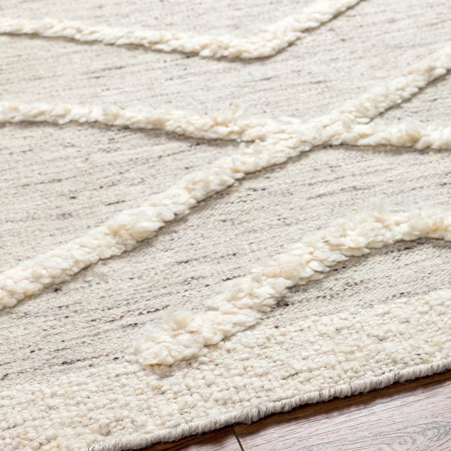 004 SI-1892179,SI-1892180,SI-1892181,SI-1892182,SI-1892183,SI-1892184 | Closeup | Tripoli Rug - 30938 by Surya in beige, cream, charcoal. Made from 100% wool in a unique style.