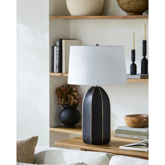 Tullich Accent Table Lamp by Livabliss in body: black; shade: white; finial: metallic - nickel; harp: metallic - nickel; cord: translucent and electroplated, painted. Made from ceramic, linen, plastic, iron in a modern style.