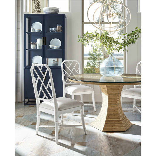 Nantucket Dining Table by Coastal Living by Universal Furniture in antique brass and natural rattan. Made from unique in a coastal style.