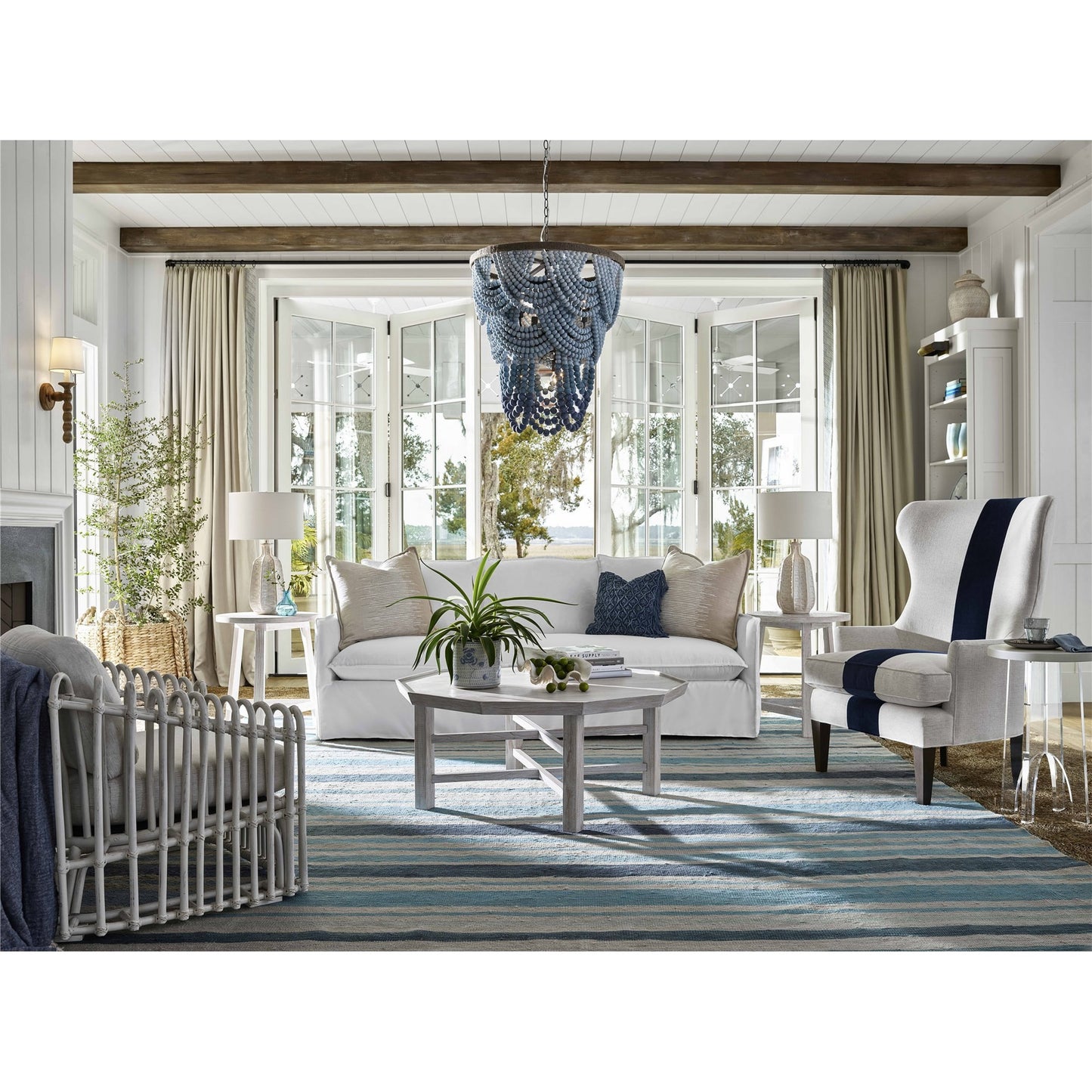 005 SI-1871249 | Lifestyle | Surfside Wing Chair by Coastal Living by Universal Furniture in nomad snow and onyx. Made from 92% polyester, 8% linen in a coastal style.