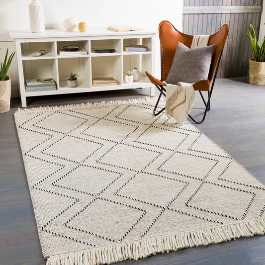 Uttar Rug - 29316 by Surya in black, cream. Made from 70% wool, 30% polyester in a unique style.