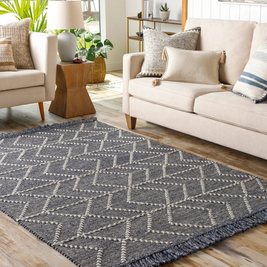 Uttar UTT-2306 Rug by Surya in charcoal, cream, light gray. Made from 70% wool, 30% polyester in a unique style.