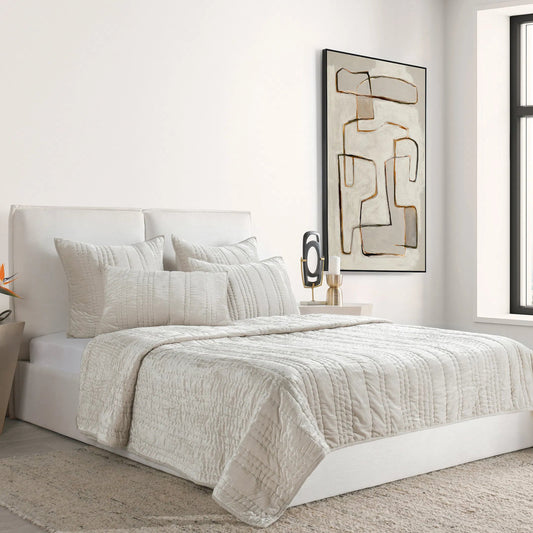 Seville Oyster Gray Quilt by Villa by Classic Home in oyster gray. Made from 70% nylon, 30% viscose in a transitional style.