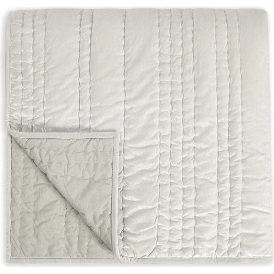 Seville Oyster Gray Quilt by Villa by Classic Home in oyster gray. Made from 70% nylon, 30% viscose in a transitional style.