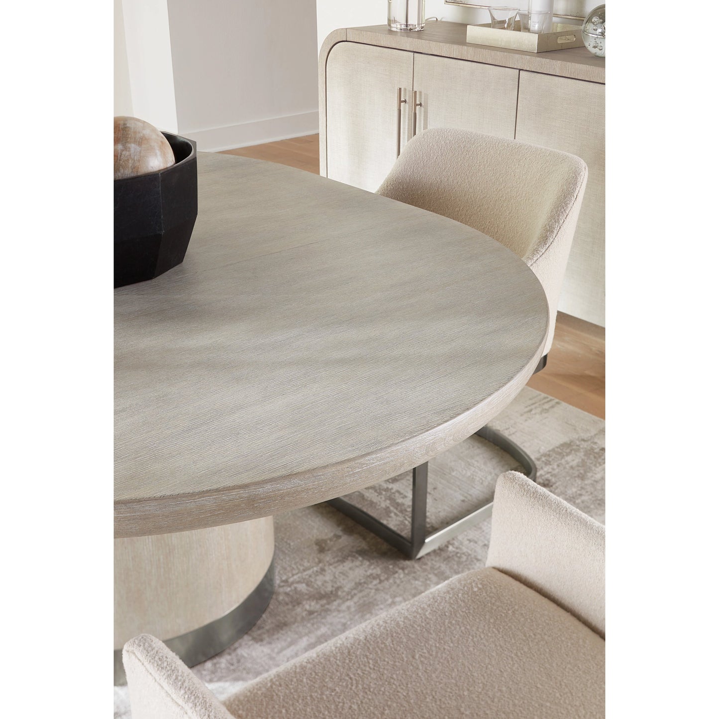007 SI-2133628 | Lifestyle | Modern Mood Round Dining Table by Hooker Furniture. Made from oak veneers, metal in a modern style.
