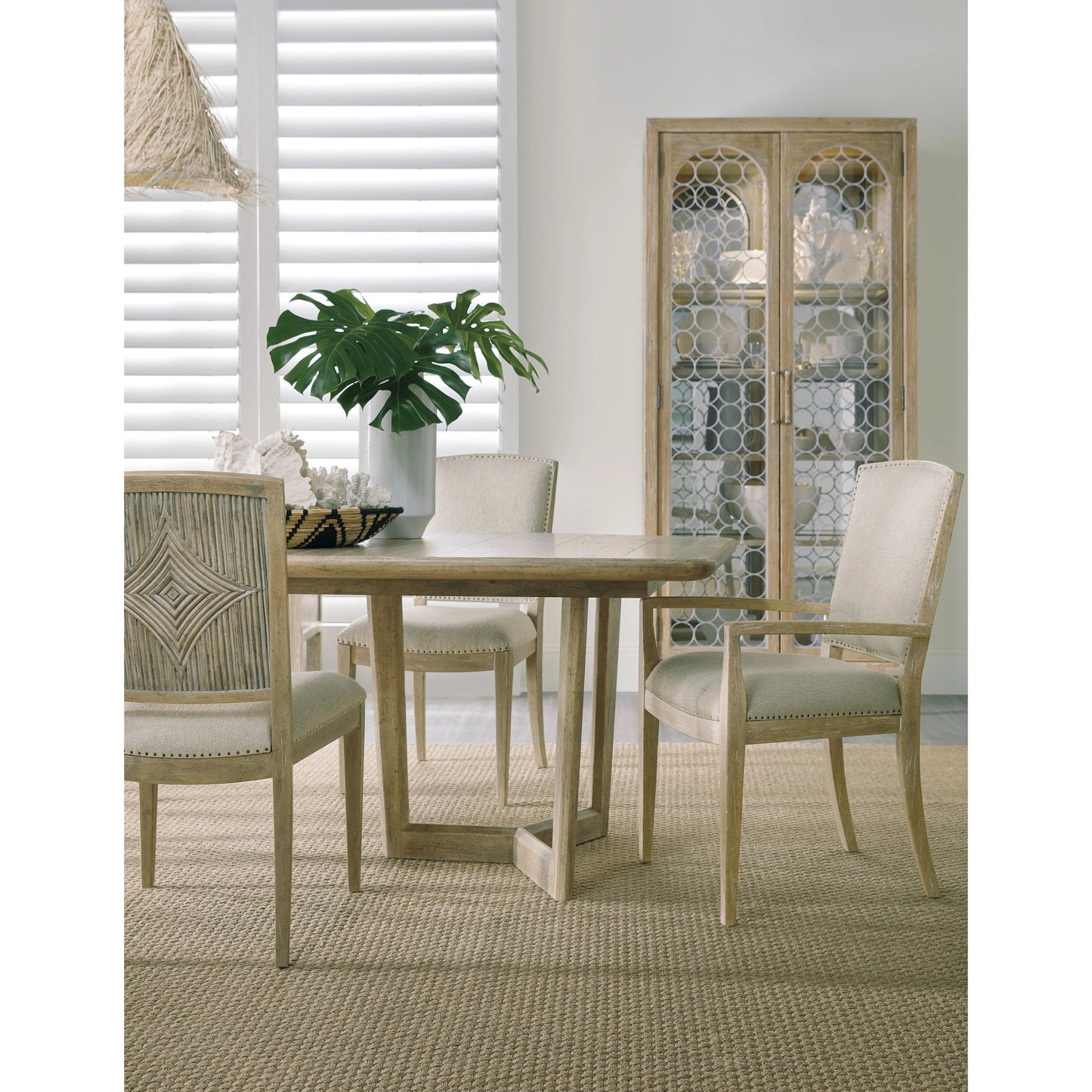 013 SI-1749862 | Lifestyle | Surfrider Dining Table by Hooker Furniture in driftwood. Made from pecan veneers with solid-wood edge top in a transitional style.