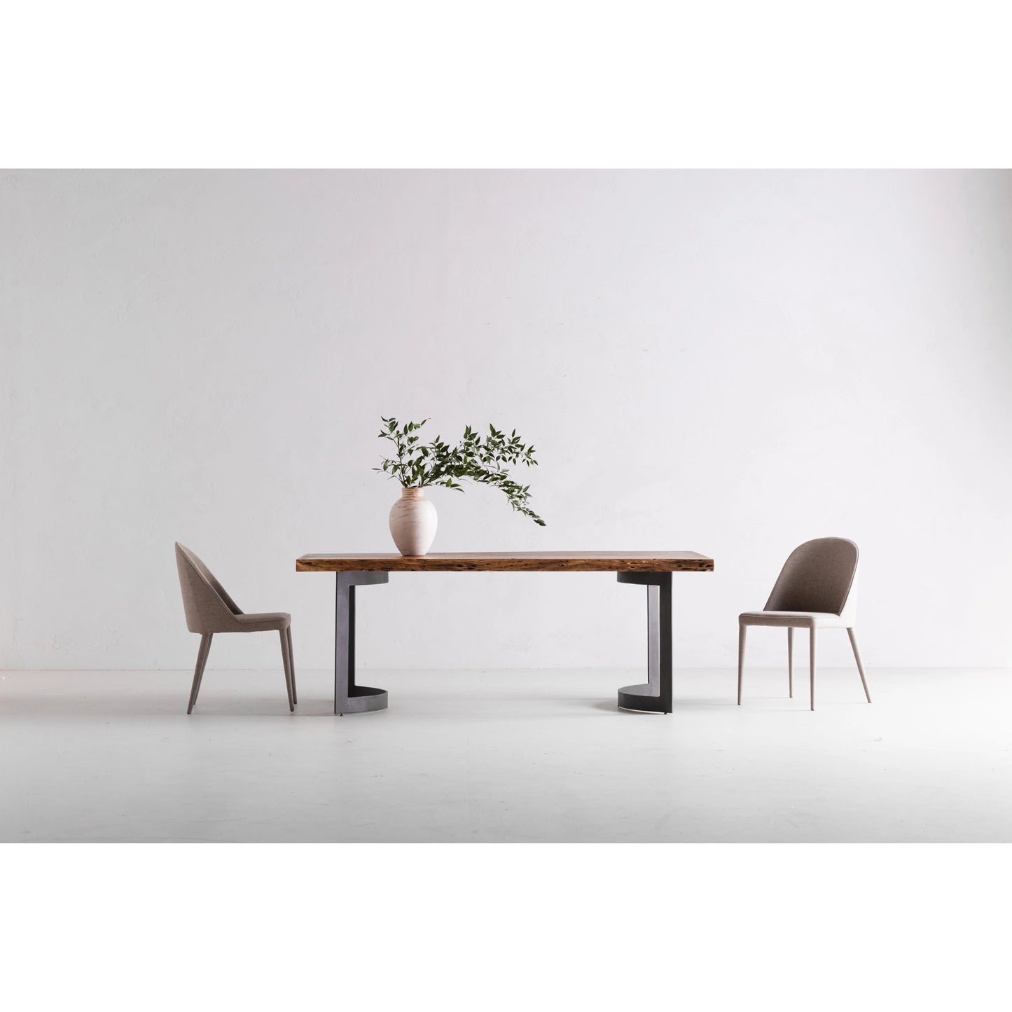 041 SI-2121872 | Lifestyle | Bent Dining Table by Moe's Home Collection in brown. Made from solid acacia, iron base in a modern style.