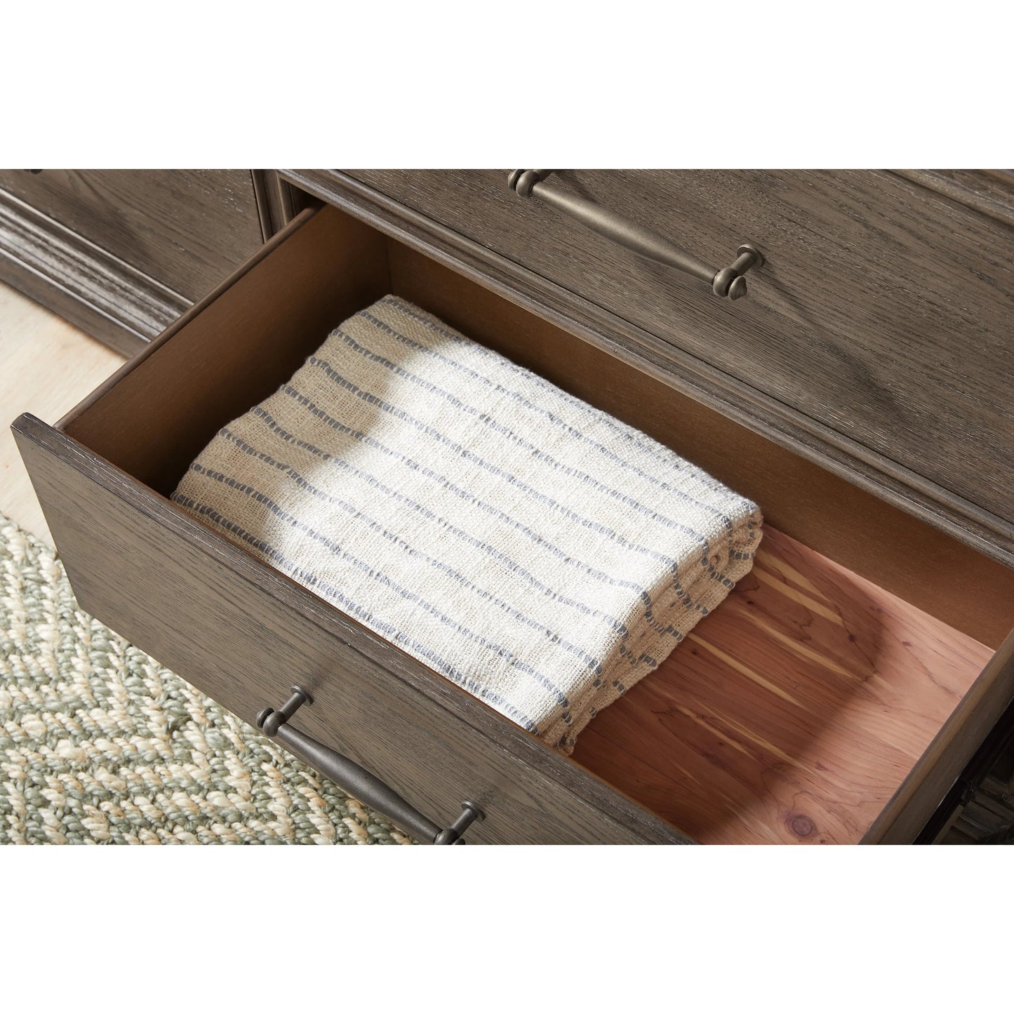 005 SI-2383583 | Closeup | Madison Ridge 14 Drawer Master Chest by Pulaski Furniture in natural bark. Made from flat-cut white oak wood veneers in a unique style.