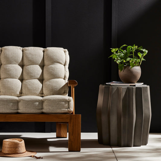 Gem Outdoor End Table by Four Hands in dark gray. Made from concrete in a modern style.
