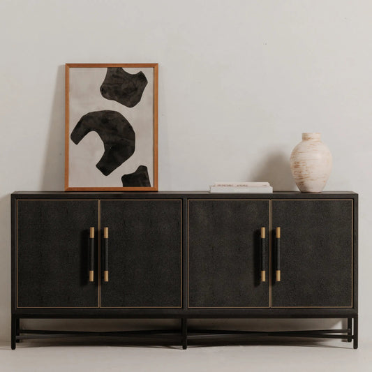Mako Sideboard by Moe's Home Collection. Made from shagreen patterned polyurethane, solid black oak frame, brass legs, plywood on door, side panel, top panel back panel in a modern style.
