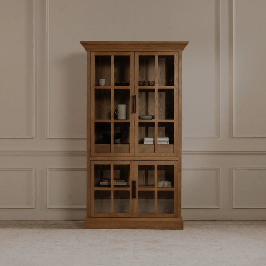 Raymond Tall Cabinet by Moe's Home Collection in natural. Made from oak on frame, oak veneer on side, top, glass on the door in a transitional style.