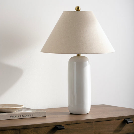 Viper Table Lamp by Surya in metallic bronze, white, black, metallic brass, beige and matte. Made from body: ceramic, shade (outside): linen, shade (inside): polyester, finial: metal in a modern style.