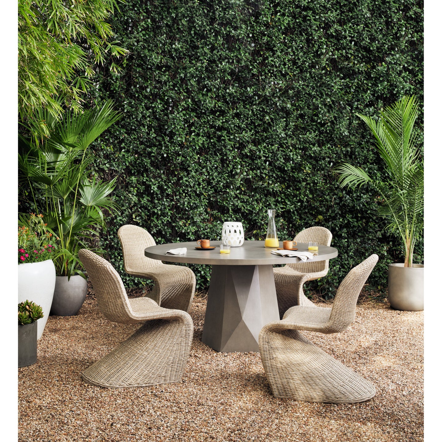 024 SI-1714548 | Lifestyle | Bowman Outdoor Dining Table by Four Hands. Made from unique in a modern style.