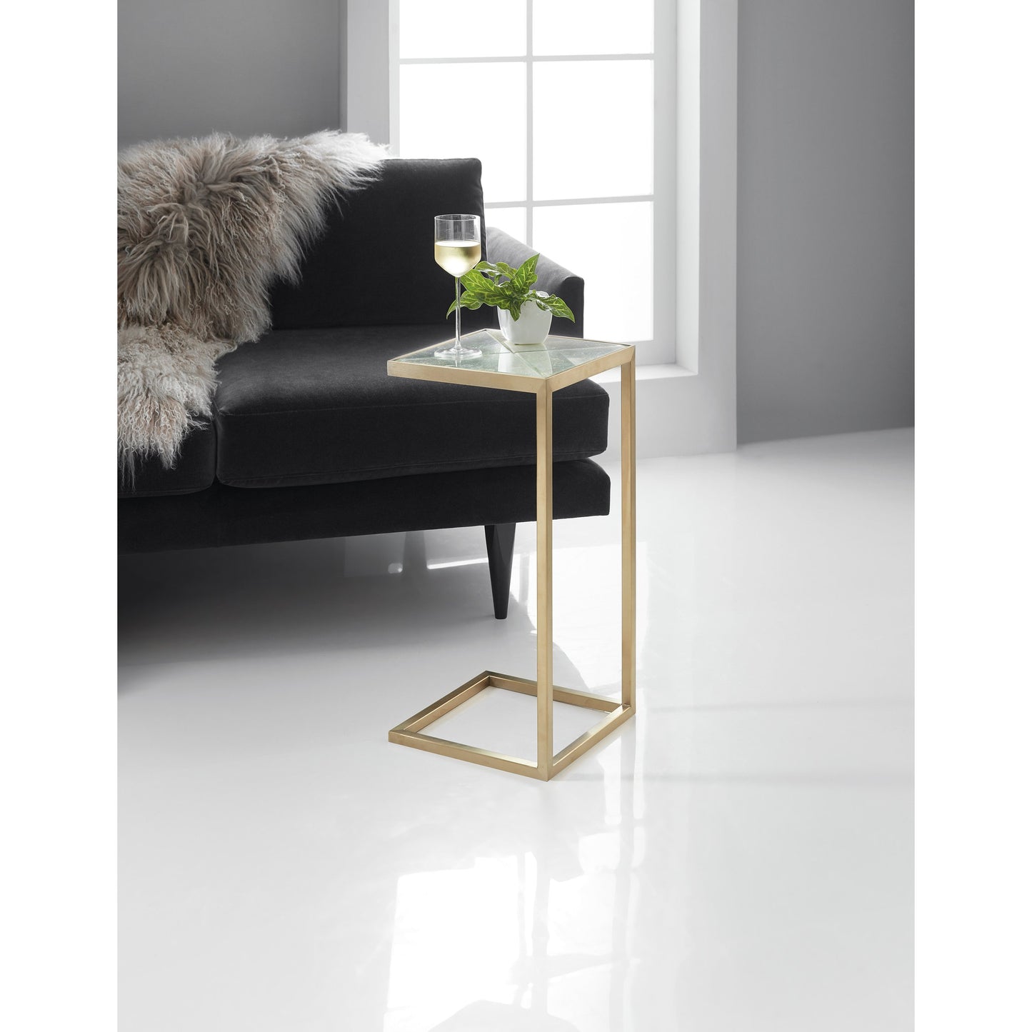 003 SI-1749216 | Lifestyle | Holmes Accent Table by Hooker Furniture in gold. Made from stainless steel with glass in a transitional style.
